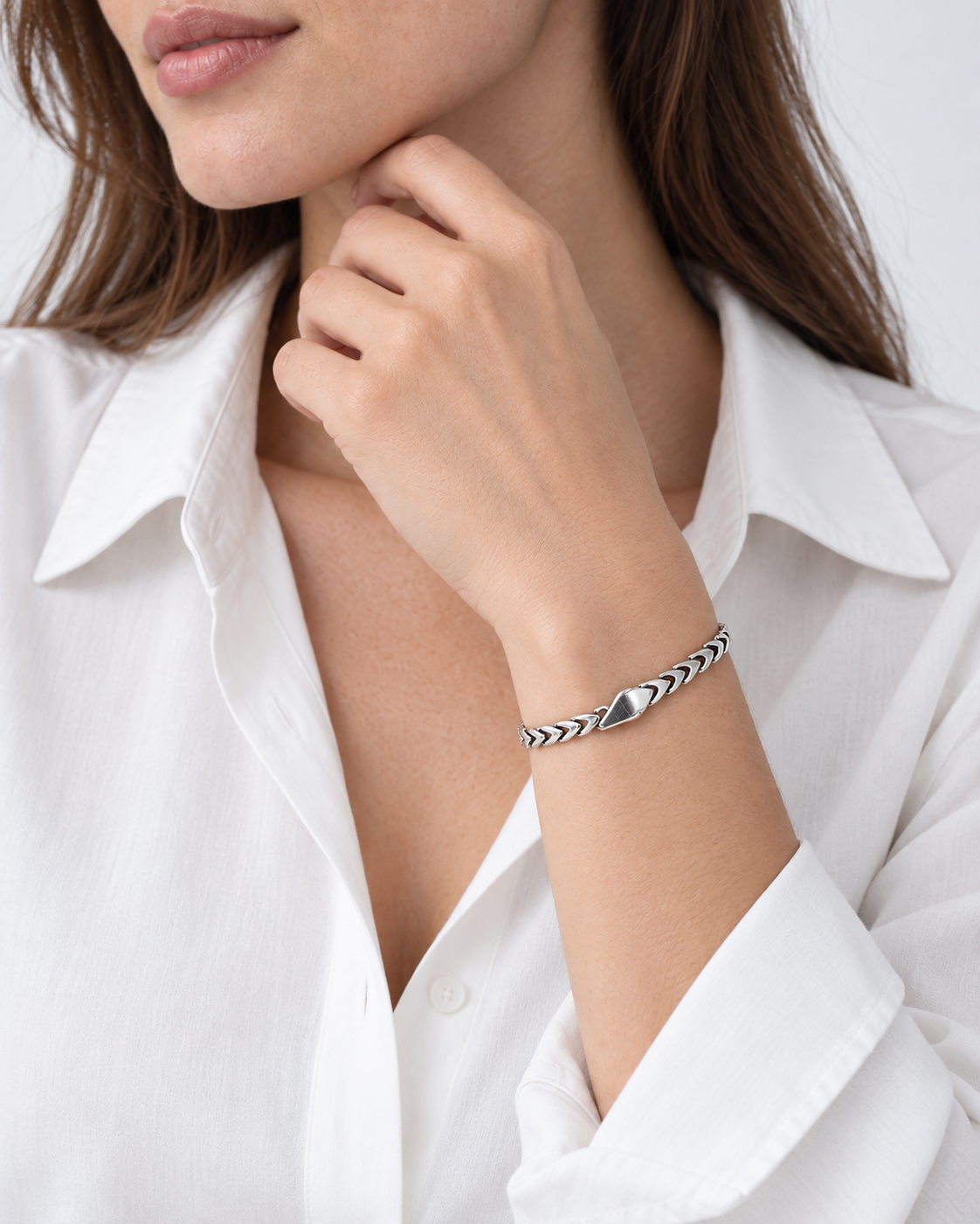 Silver bracelet worn by the model